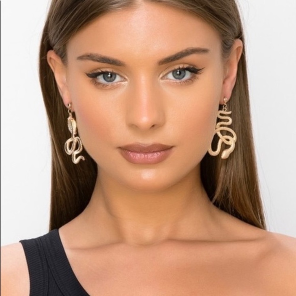 Gold detailed cobra snake fashion style earrings